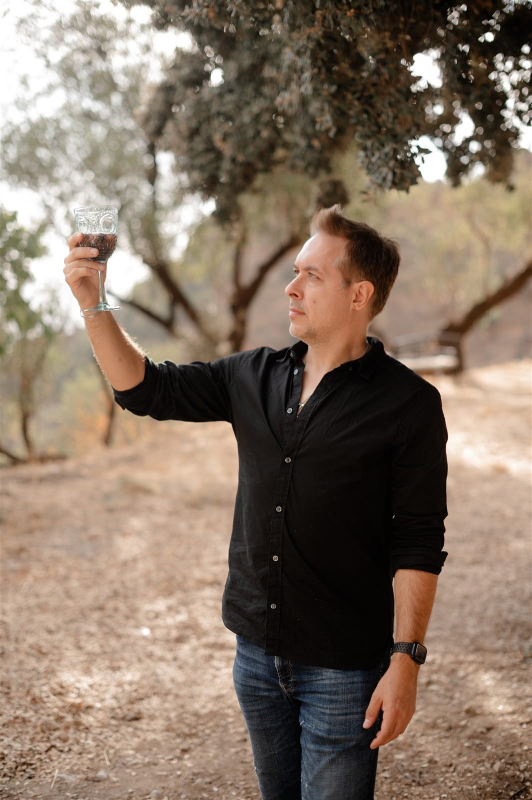 Raising a toast to the harvest under the old oak tree